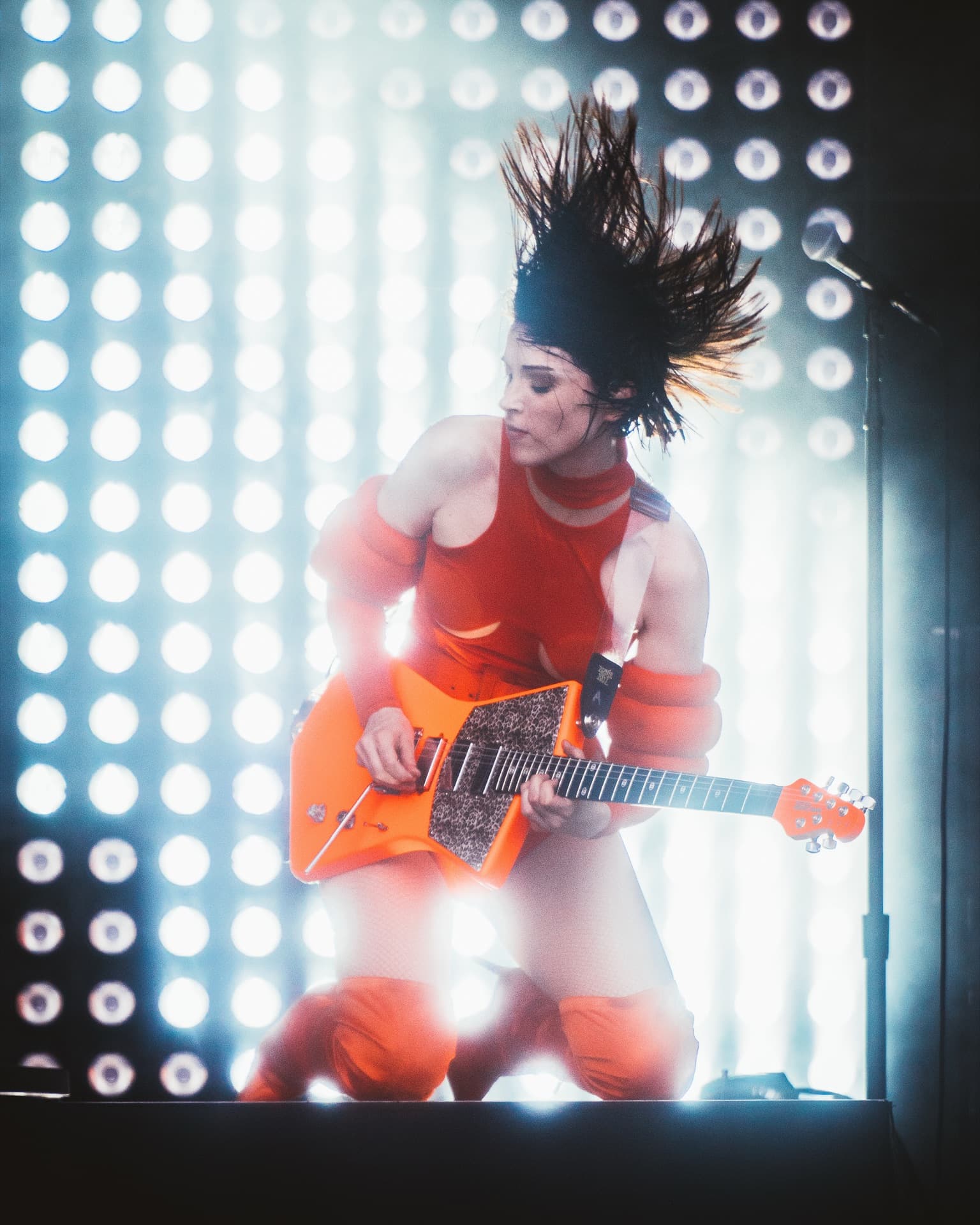 Live concert scene with atmospheric stage lights