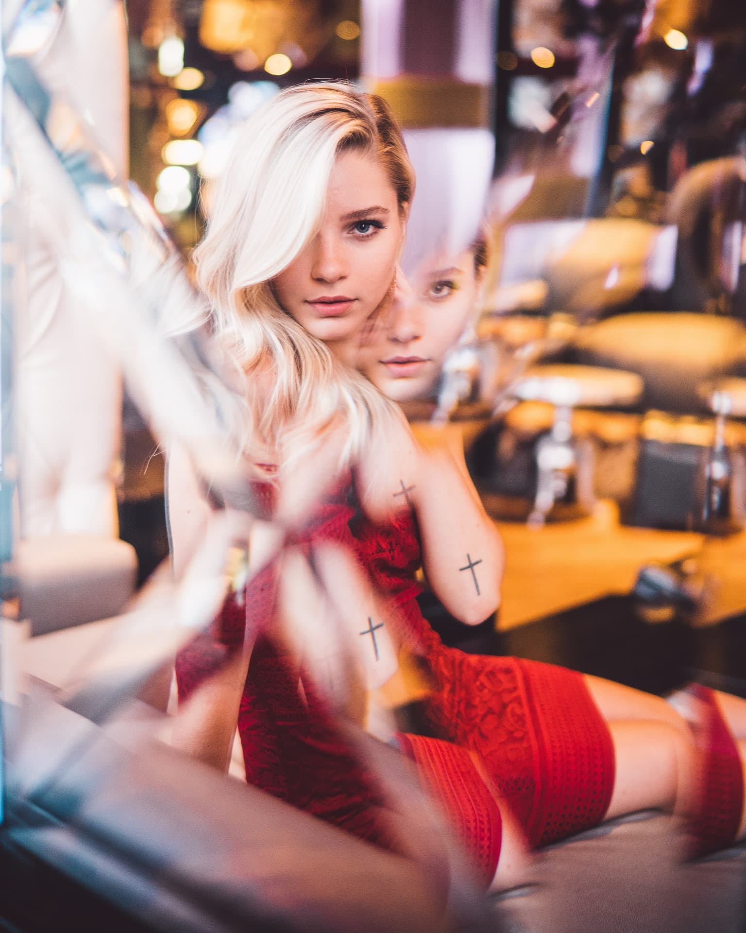 Portrait of woman reflected in mirror, double exposure